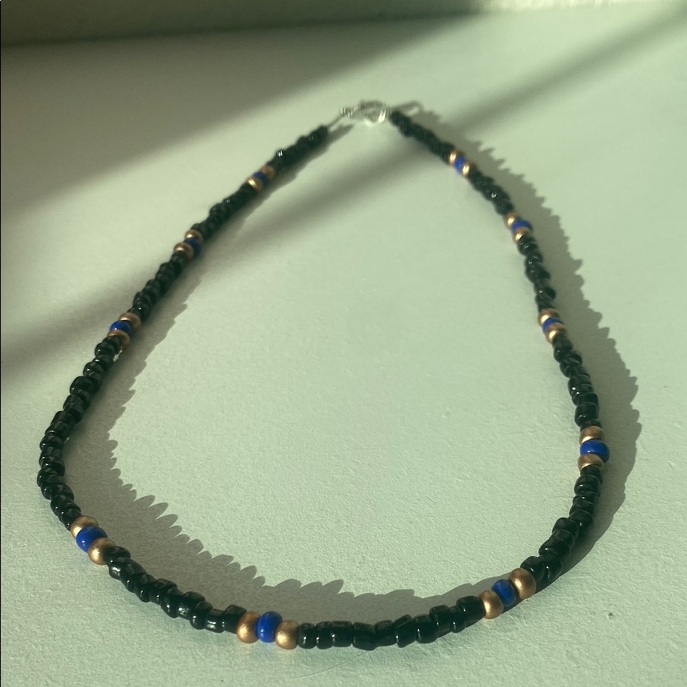 Beaded Necklace with Black, Blue, and Gold Accents